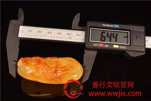  火龙牌一块，蜡质俏色红润