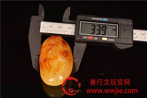  火龙牌一块，蜡质俏色红润