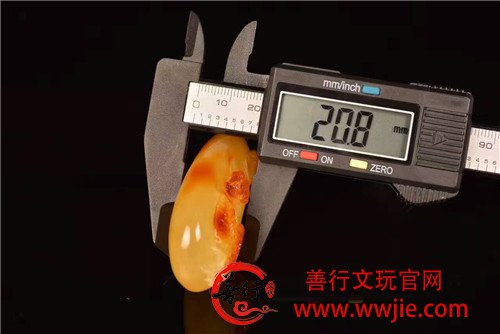  火龙牌一块，蜡质俏色红润