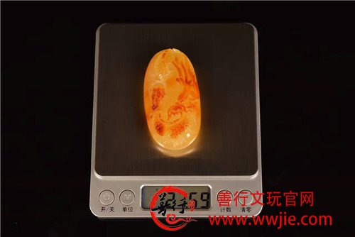  火龙牌一块，蜡质俏色红润